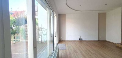 Reihenmittelhaus mit Studio-Dachgeschoss und schönem Garten