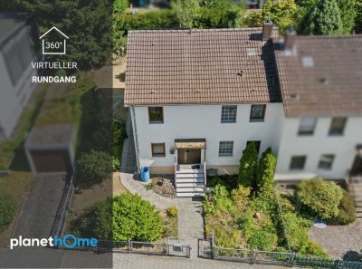 Charmantes Reihenendhaus mit PV-Anlage, Balkon und Garage in Bubenreuth