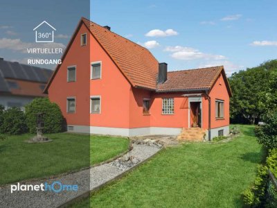 Einfamilienhaus mit großem Garten und einigen Extras, auch nutzbar als Zweifamilienhaus