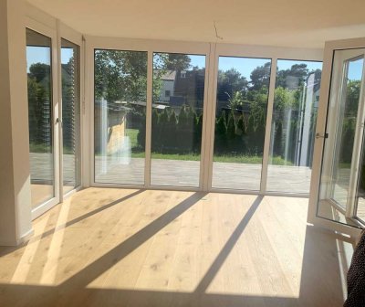 Moderne Wohnung mit Garten