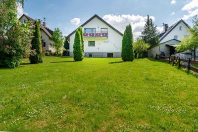 Zweifamilienhaus mit großzügigem Gartenparadies – Ihr Rückzugsort zum Wohlfühlen