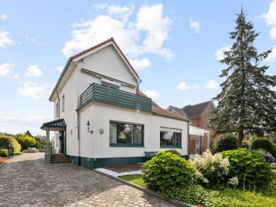 Kapitalanlage – Großes Zweifamilienhaus mit Einliegerwohnung und herrlichem Grundstück in Tangstedt