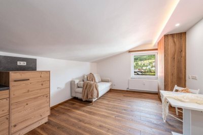 Klein, fein &amp; mit atemberaubendem Ausblick – Dachgeschosswohnung im Mitten von Schladming