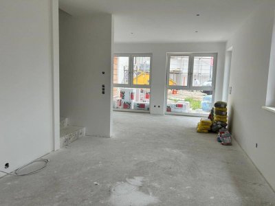 Moderne Gartenwohnung in St. Marien: Erstbezug mit Terrasse und 2 Stellplätzen zur Miete!