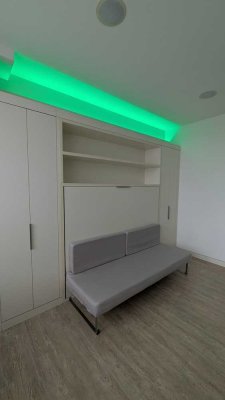 Olympia Tower: Exklusive vollmöblierte Wohnung mit Fitnessstudio