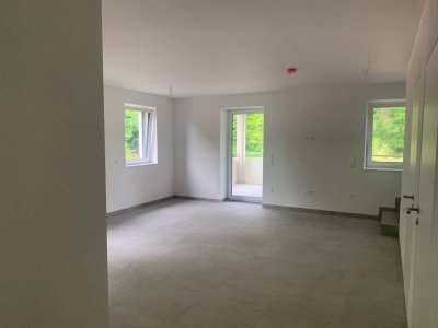 Erstbezug: Traumhafte Maisonette mit großzügigem, überdachtem Balkon