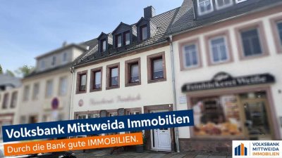 Wohnhaus mit Ladengeschäft im Erdgeschoss in zentraler Lage