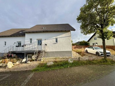 Einfamilienhaus mit Terrasse, Garten und Stellplätzen