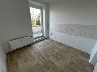 Frisch sanierte 2-Zimmer-Wohnung im Erdgeschoss mit Balkon!