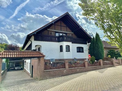Repräsentatives Einfamilienhaus mit gut vermietbarer Einliegerwohnung und tollem Außenbereich