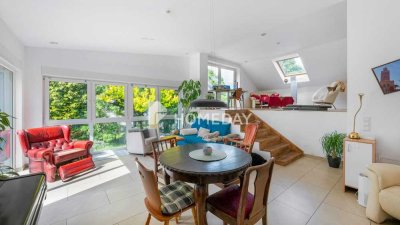 Vielseitiges Einfamilienhaus mit Gewerbeeinheit und großem Platzangebot