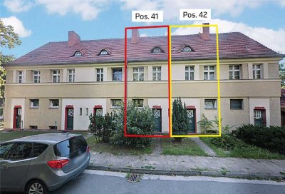 Leerstehendes Reihenmittelhaus mit angrenzender Gartenfläche