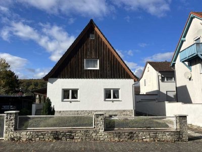 1-2 Familienhaus mit 8 Zimmern und schönem grossen Garten sowie Garage / Stellplätze