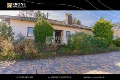 Familientraum in Minfeld: Bungalow mit Einliegerwohnung und Garten
