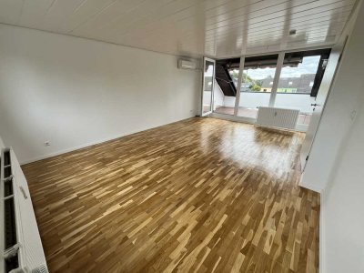 Frisch renoviert, 2 Zi. DG-Wohnung, ab sofort