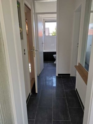 Exklusive, sanierte 1-Zimmer-DG-Wohnung mit Balkon und Einbauküche in Stuttgart