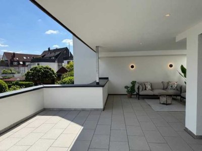 4,5-Zimmer-Wohnung mit Sonnenbalkon: Neubau-Erstbezug! Wohnen an der grünen Mitte von Ruit!