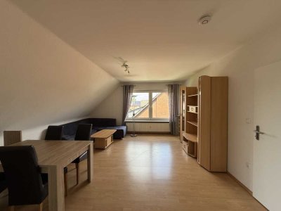 Schöne und gepflegte 3-Raum-Dachgeschosswohnung mit Einbauküche in Neustadt am Rübenberge