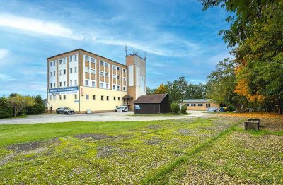 Renditestarkes Wohn- und Geschäftshaus mit großzügigem Grundstück