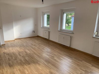 Diese Wohnung überzeugt mit stilvoller Sanierung; ebenerdige Dusche, hochwertige Böden und praktischer Grundriss - perfekt für Paare oder kleine Familien!