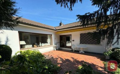 Ihre Chance auf ein einzigartiges Zuhause - Freistehender Winkelbungalow mit sonnigem Garten