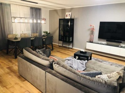 Exklusive, stilvolle und moderne 3-Zimmer-Wohnung mit Garten in perfekter Lage