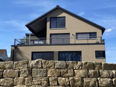 Rendite Objekt: Vermietete Neubau 2.5 Zi.  Wohnung mit Garten und Carport