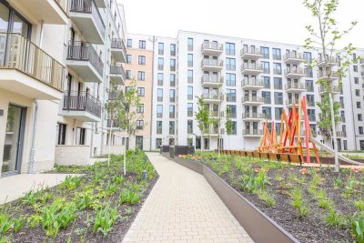 Lichtdurchflutete 2-Zimmer-Wohnung mit Balkon, hochwertiger Einbauküche und Tiefgarage