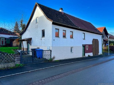 Gemütliche Immobilie mit integrierter Scheune und geschützter Terrasse