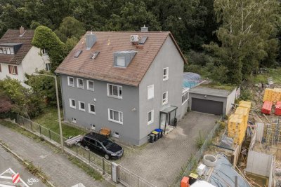 Charmantes Zweifamilienhaus mit großem Garten & Pool in ruhiger Lage