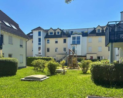 Frei werdend ab Dezember -  Maisonettewohnung mit Balkon und Tiefgaragenstellplatz