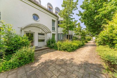 Grünwald, 2-Zimmer-Wohnung mit Wohnküche, Loggia in Südausrichtung und Gartenblick!