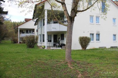 Exklusive Erdgeschosswohnung mit Terrasse und Gartenanteil in idyllischer Waldrandlage