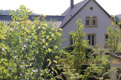 Naturnahe wohnen: Eigentumswohnung mit weitläufigem Garten