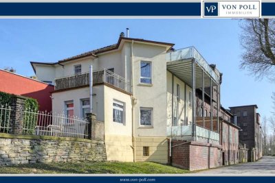 Große Erdgeschosswohnung mit schöner Terrasse in grüner Wohnlage am Stadtrand