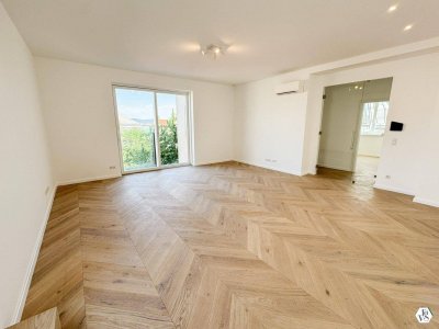 Exklusive Dachgeschoß-Wohnung in zentraler Lage - Erstbezug mit Terrasse und hochwertiger Ausstattung