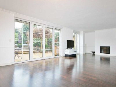 Wohnen in Bestlage – stilvolles Zuhause mit Atriumgarten und gehobener Ausstattung