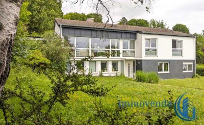 Traumimmobilie mit Einliegerwohnung und Zaubergarten inmitten einer grünen Oase!