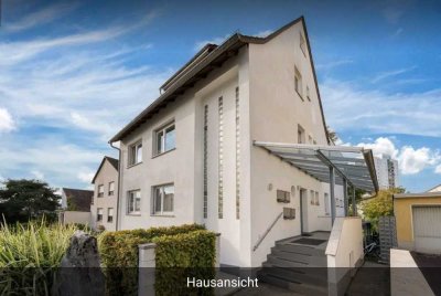 Exklusive 4,5-Raum-Wohnung mit geh. Innenausstattung, EBK in Langen, Garten und Stellplatz am Haus