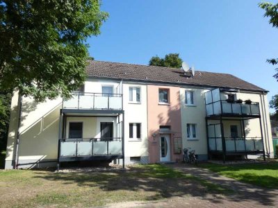 Top-Erdgeschoss-Wohnung mit Balkon
