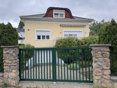 Voll unterkellertes Einfamilienhaus mit Südterrasse und Garage – Ihr neues Zuhause!