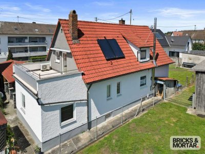 Grünes Wohnglück mit Dachterrasse - Einfamilienhaus mit Kaminofen & Garten