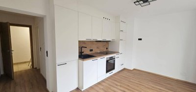 Gemütliche Singlewohnung mit Balkon, Parkplatz und Kellerabteil