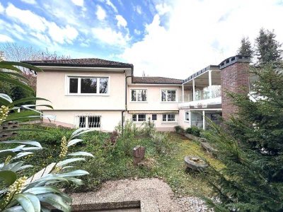 EINFAMILIENHAUS MIT EINLIEGERWOHNUNG...