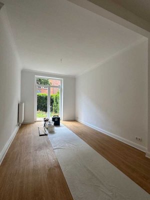 Erstbezug nach vollständiger Sanierung! 2-Zimmer-EG-Wohnung mit Wohnküche & kleinem Garten