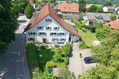 Attraktive Kapitalanlage: Mehrfamilienhaus + Gewerbe, Entwicklungschancen & großzügigem Grundstück