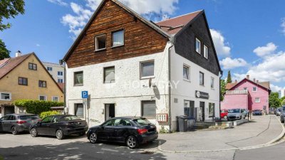 Solides Mehrfamilienhaus mit sechs Wohneinheiten, einer Gaststätte und Parkplätzen