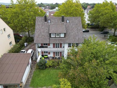 Mehrfamilienhaus mit drei gepflegten Wohnungen, Garten & Doppelgarage in zentraler Lage