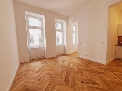 ERSTBEZUG - Top sanierte Kleinwohnung mit Tischlerküche am direkt YPPENPLATZ
