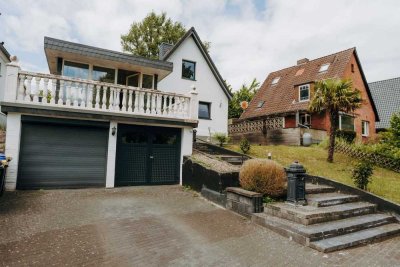 Neuer Preis ! - Zwei Häuser, ein Traum: Vielseitiges Wohnen auf gepflegtem Grundstück